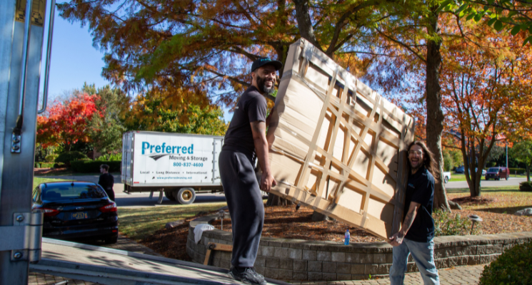 Preferred Moving & Storage team with clean moving truck, serving Metro Detroit communities like Shelby Township and Sterling Heights